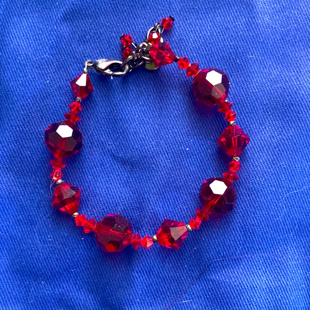 Adorable dark read beaded bracelet.
